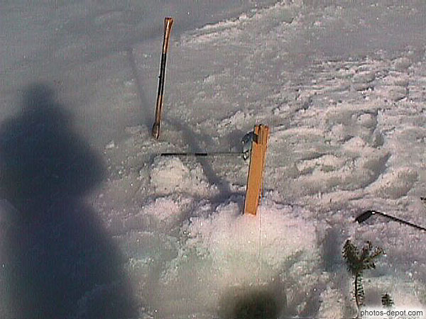 photo de pêche à la ligne sur la glace