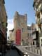 Donjon Gilles Aycelin, tour carrée affirmant l'autorité de l'évèque, couronné de 3 échauguettes d'angle octogonales et d'une guette / France, Languedoc Roussillon, Narbonne, place de l'hôtel de ville