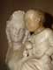 Détail Vierge au sourire et enfant Jésus tenant une colombe, le St Esprit,  Sienne, Italie, musée lapidaire / France, Languedoc Roussillon, Carcassonne, Chateau Comtal