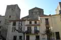 Maisons masquant le pied de l'Abbaye / France, Languedoc Roussillon, Arles sur Tech
