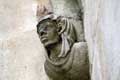Cul-de-lampe : visage au nez pointu et grandes oreilles, couvert d'un voile / Espagne, Castille, Burgos, Cathedrale