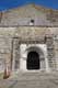 Puerta del Poder : porte du pouvoir à 3 archivoltes sculptées, surmontée de têtes sur modillons